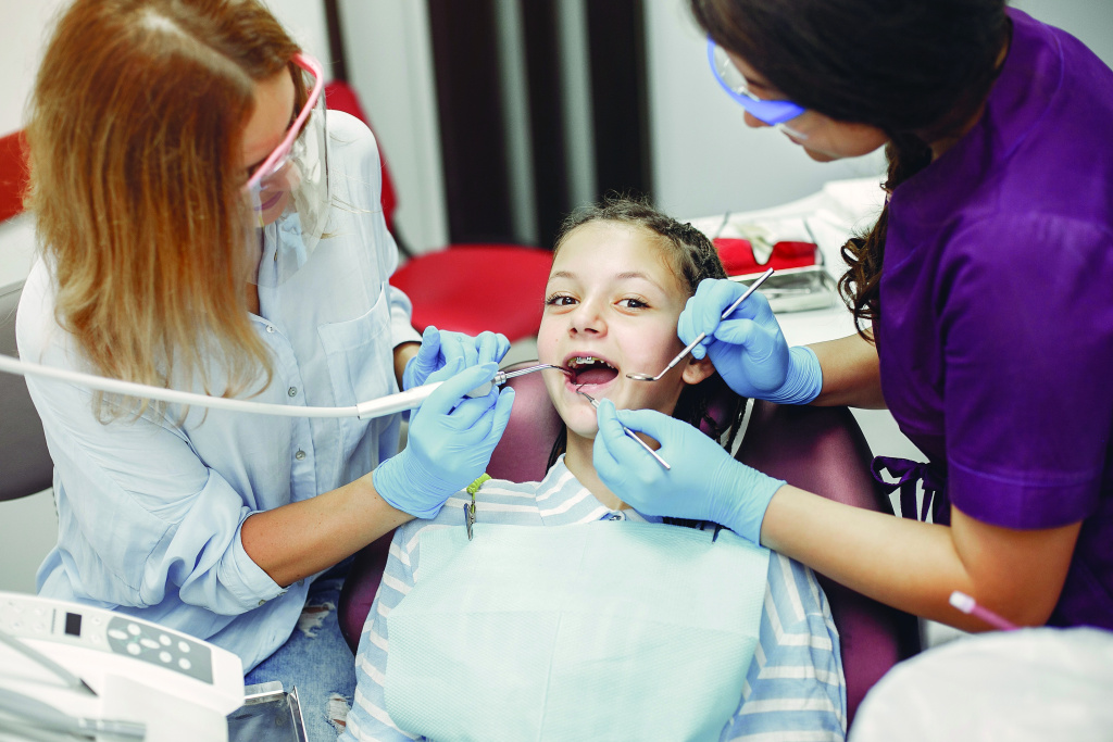 beautiful-little-girl-sitting-dentist-s-office.jpg